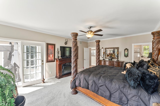 carpeted bedroom featuring ceiling fan, crown molding, and access to exterior