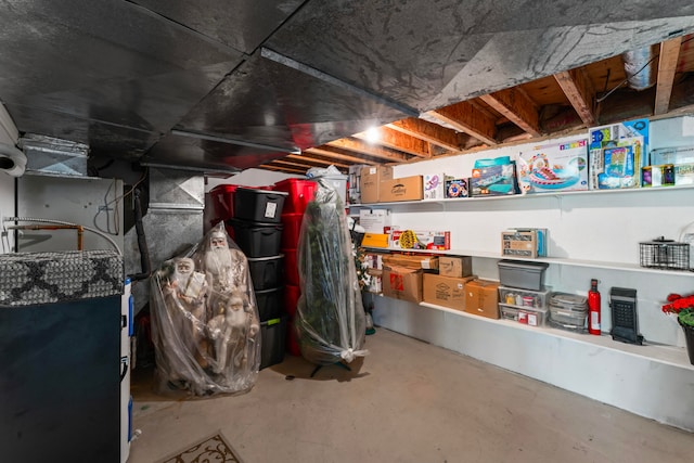 basement featuring heating unit