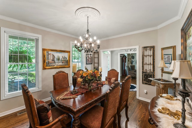 dining area with crown molding, a chandelier, and dark hardwood / wood-style floors