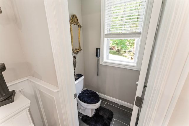 bathroom with tile patterned floors and toilet