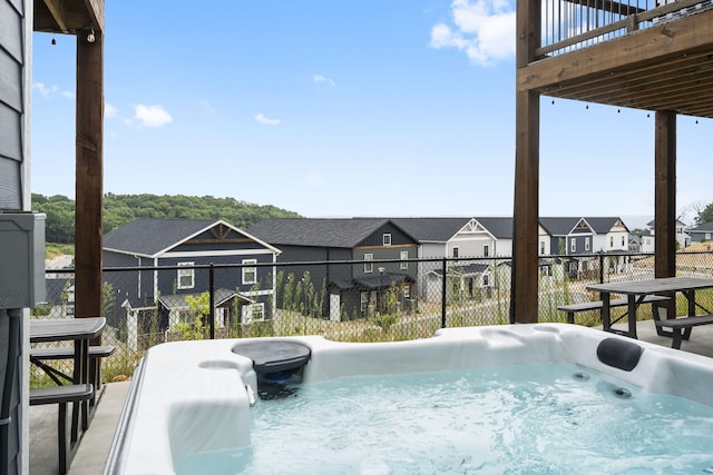 view of pool featuring a hot tub