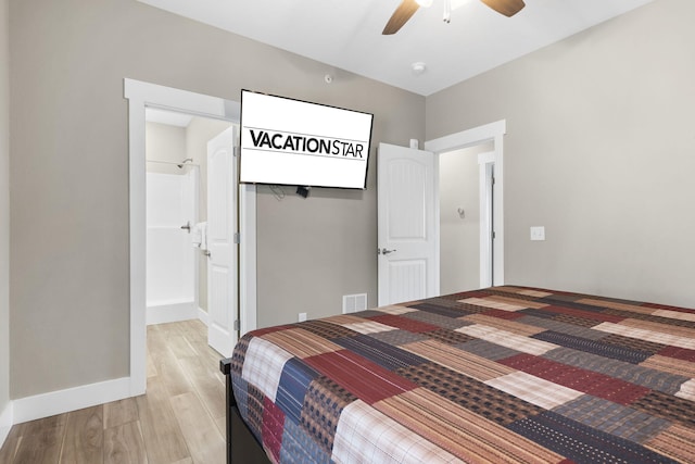 bedroom featuring ceiling fan, ensuite bath, and light hardwood / wood-style floors