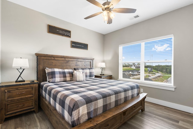 bedroom featuring wood-type flooring and ceiling fan