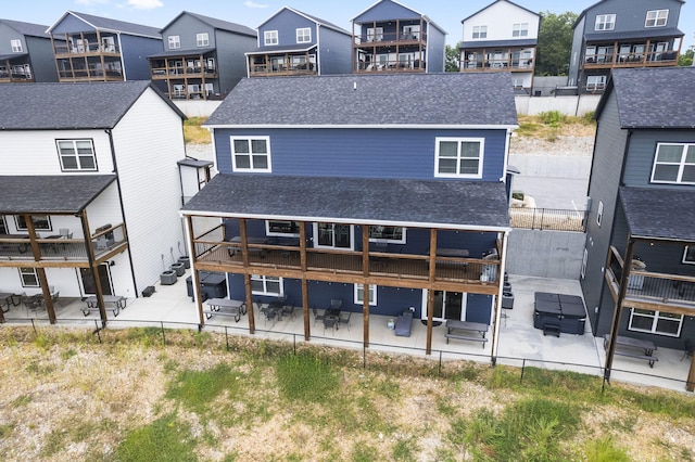 back of house featuring a patio area