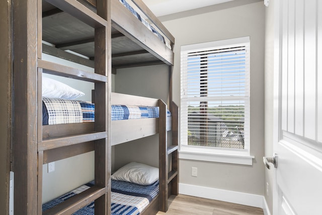 bedroom with light hardwood / wood-style floors