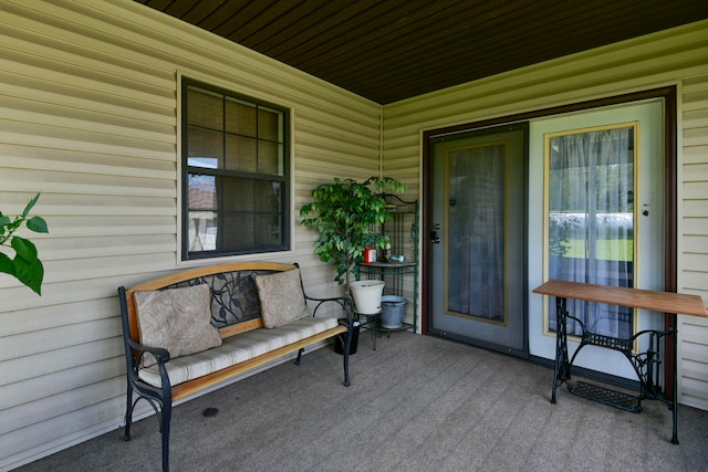 entrance to property with a patio area