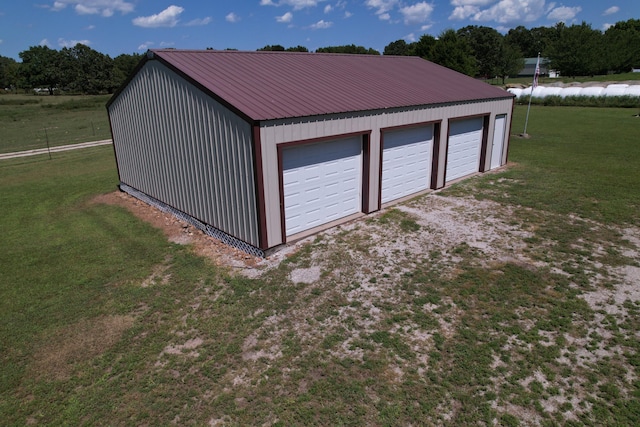 garage with a yard