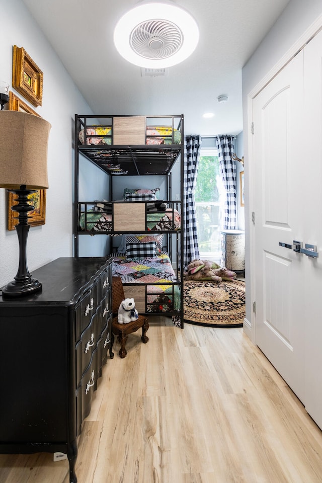 bedroom with light hardwood / wood-style floors