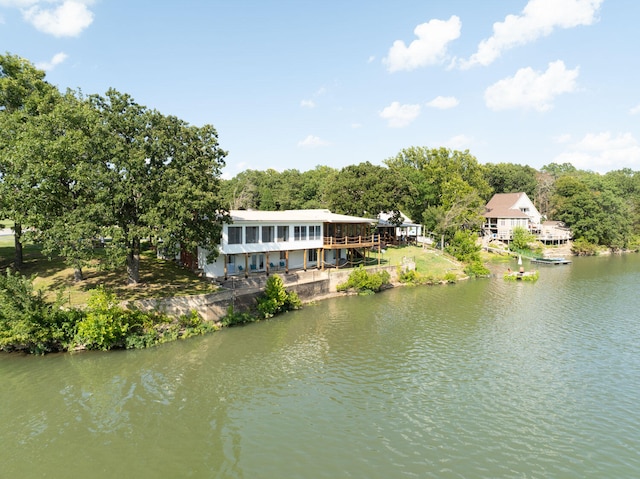 exterior space with a water view