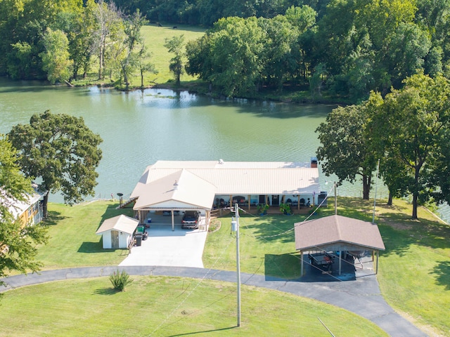 birds eye view of property featuring a water view