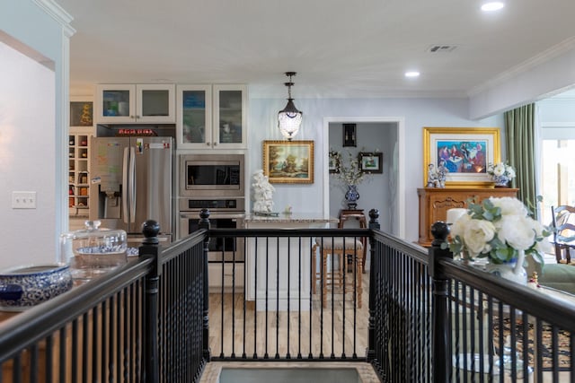 interior space with crown molding