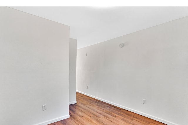 empty room with light wood-type flooring
