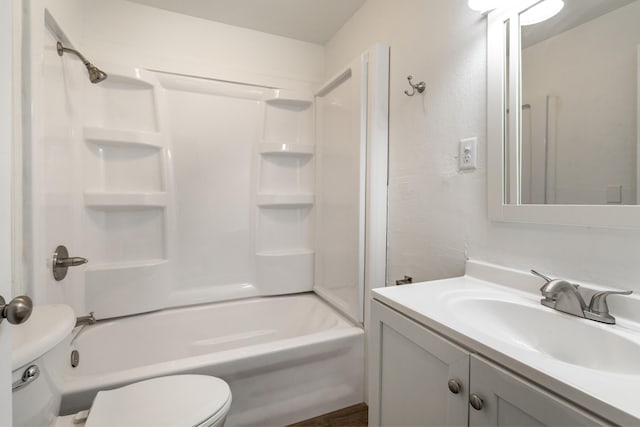 full bathroom with shower / bath combination, vanity, and toilet