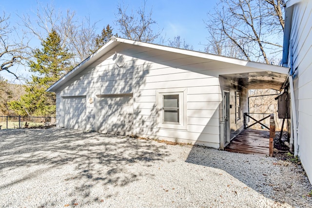 exterior space with a garage