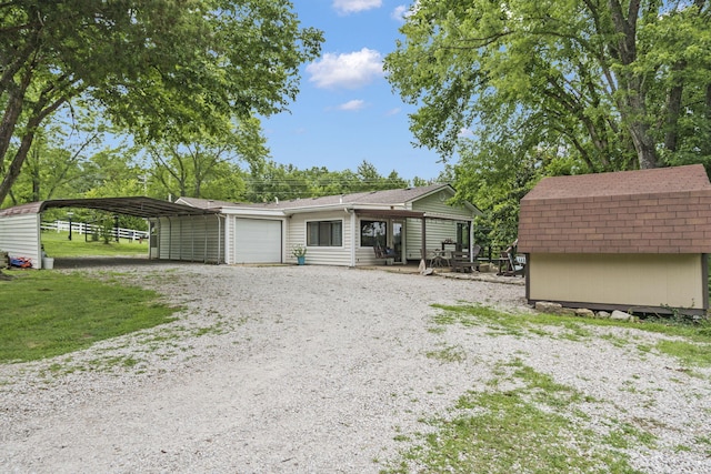 view of front facade with a carport