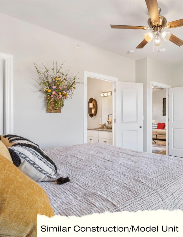 bedroom featuring ceiling fan and ensuite bath