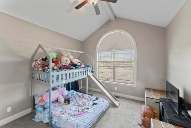 bedroom featuring ceiling fan, lofted ceiling with beams, and carpet flooring