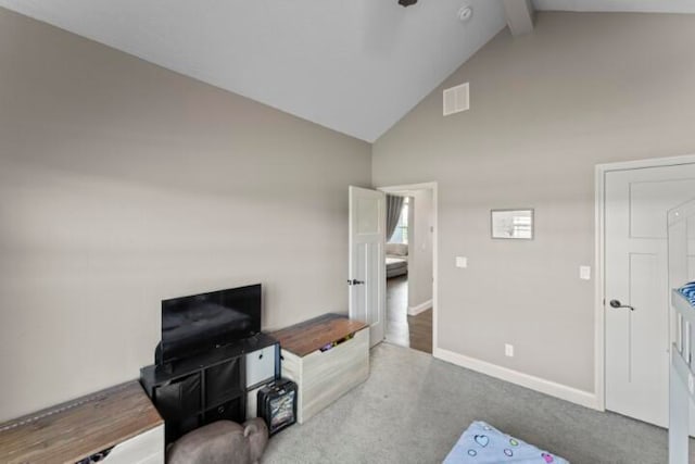 carpeted living room featuring high vaulted ceiling and beamed ceiling