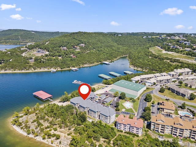 birds eye view of property featuring a water view