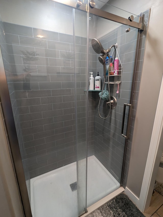 bathroom with an enclosed shower