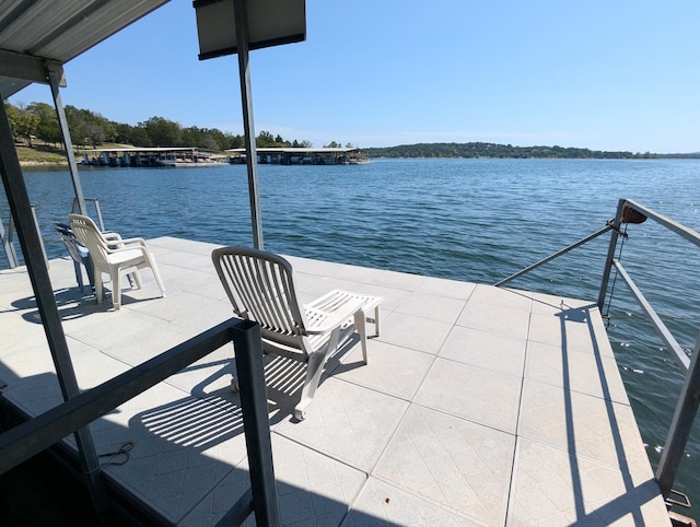 view of dock with a water view