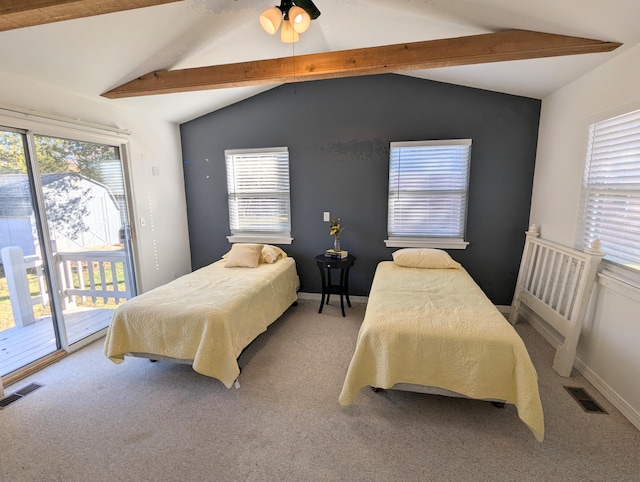 carpeted bedroom featuring access to exterior, vaulted ceiling with beams, and ceiling fan