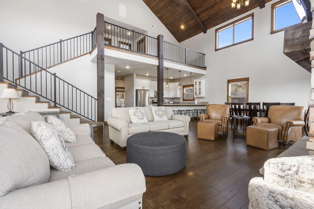 living room featuring high vaulted ceiling, wooden ceiling, beamed ceiling, and dark hardwood / wood-style flooring