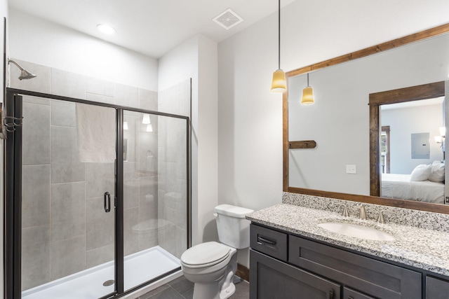 bathroom with tile patterned floors, toilet, walk in shower, and vanity