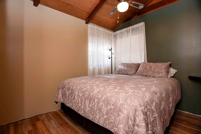 bedroom featuring vaulted ceiling with beams, ceiling fan, hardwood / wood-style floors, and wooden ceiling