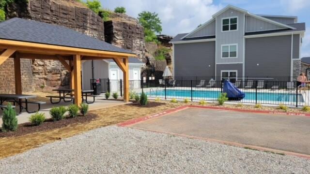 view of pool featuring a gazebo and a patio area