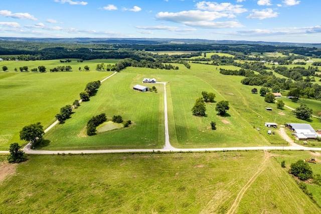 birds eye view of property featuring a rural view