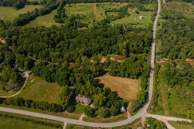 birds eye view of property featuring a rural view