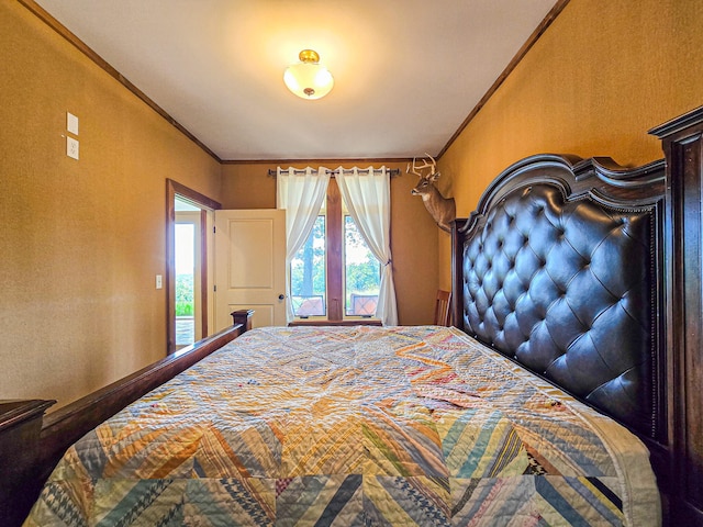 bedroom with crown molding