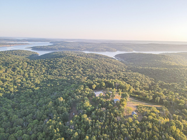 aerial view at dusk with a water view