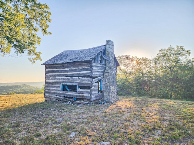 view of outdoor structure at dusk