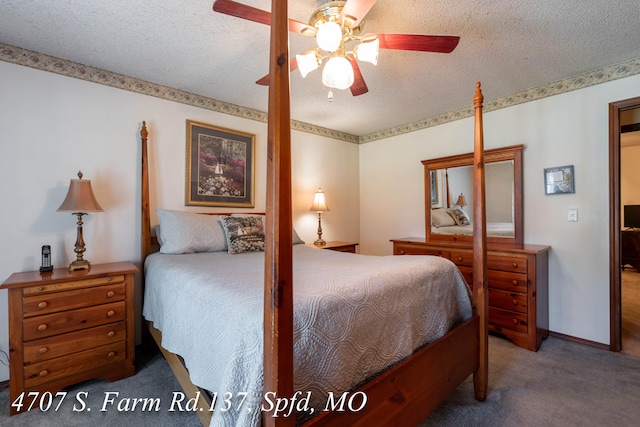 bedroom with carpet floors, a textured ceiling, and ceiling fan