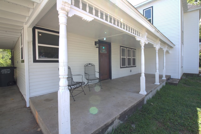 view of patio featuring a porch