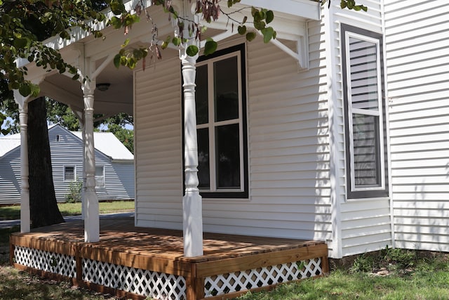 view of property exterior with a deck