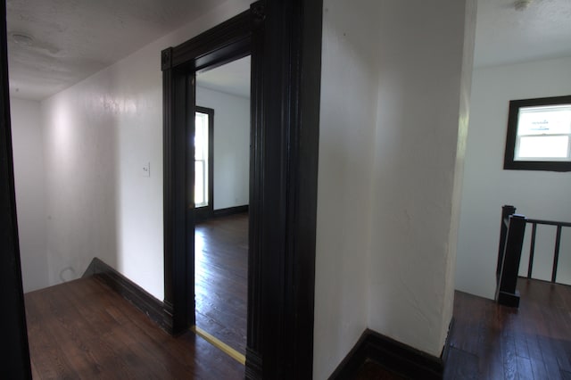 327 E Chestnut St, Bolivar, MO 65613 - corridor featuring wood-type flooring
