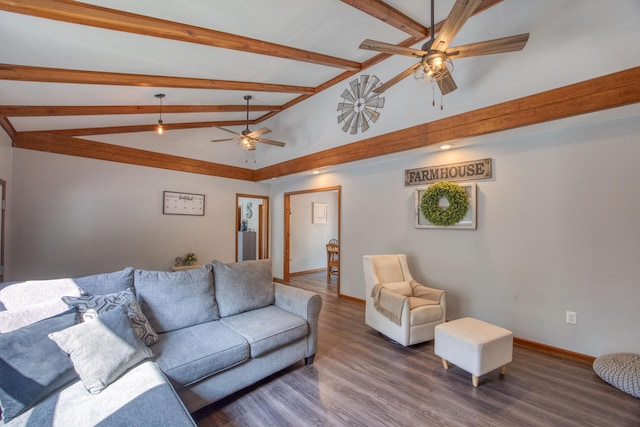 living area featuring wood finished floors, a ceiling fan, baseboards, and vaulted ceiling with beams