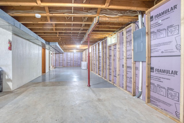 unfinished below grade area with electric panel