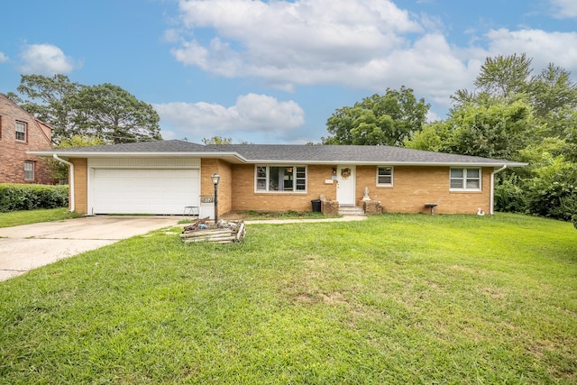 single story home with a garage and a front yard