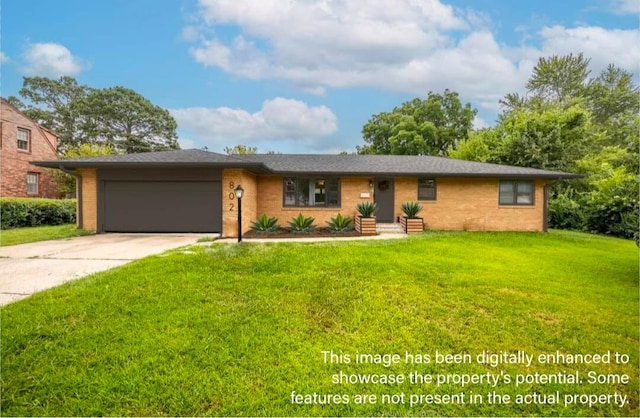 ranch-style home featuring a front lawn and a garage