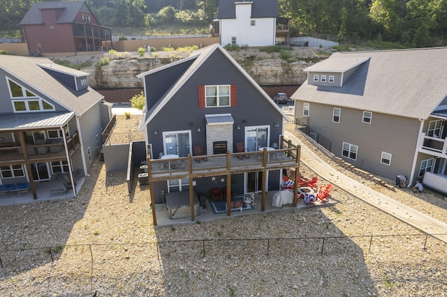 rear view of property featuring a patio area