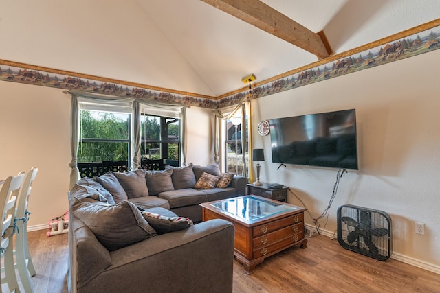 living room with hardwood / wood-style flooring, beam ceiling, and high vaulted ceiling