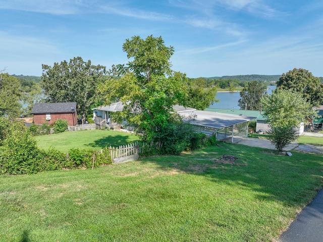 view of yard with a water view