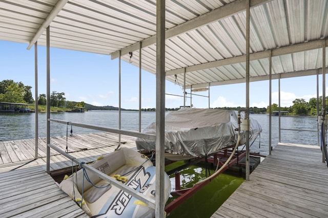 dock area featuring a water view