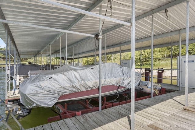 dock area featuring a water view