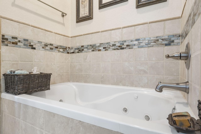 bathroom with tiled tub