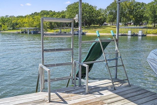 dock area featuring a water view